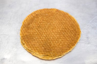 stack of fresh homemade waffles with sugar