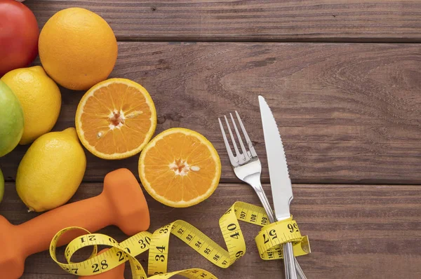 Fruits Citrus Weights Cutlery Measuring Tape Wooden Background — Stock Photo, Image
