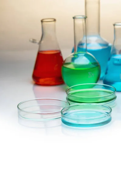 flasks with bright liquids in chemical laboratory