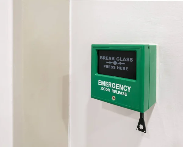 Emergency door releases to provide a physical method of unlocking an electronic lock in the event of an emergency