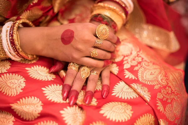 Displaying of gold jewellery in marriage.