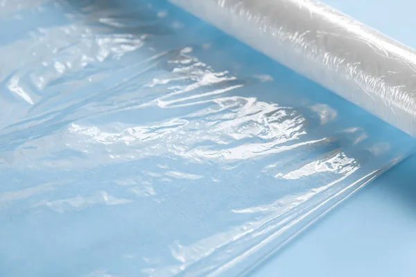 Cling film on a blue background.