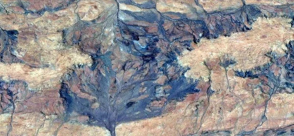 Van Gogh drunk, abstract photography of the deserts of Africa from the air. aerial view of desert landscapes, Genre: Abstract Naturalism, from the abstract to the figurative, contemporary photo art