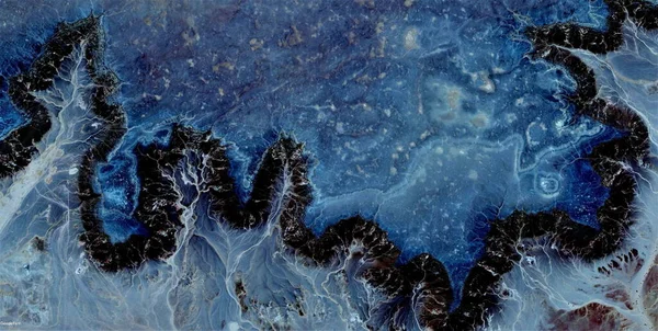 the starry night, tribute to Van Gogh,abstract photography of the deserts of Africa from the air, aerial view of desert landscapes, Genre: Abstract Naturalism, from the abstract to the figurative, contemporary photo