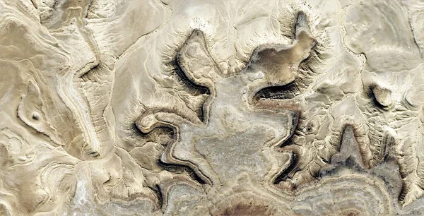 dance, abstract photography of the deserts of Africa from the air, aerial view of desert landscapes, Genre: Abstract Naturalism, from the abstract to the figurative, contemporary photo