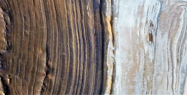 Saturn's rings, abstract photography of the deserts of Africa from the air, aerial view of desert landscapes, Genre: Abstract Naturalism, from the abstract to the figurative, contemporary photo