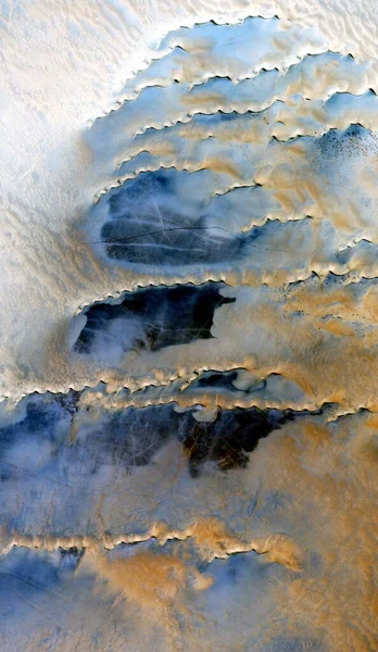 heavenly waves, vertical abstract photography of the deserts of Africa from the air, aerial view of desert landscapes, Genre: Abstract Naturalism, from the abstract to the figurative,