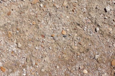 Farklı şekillerde ve betondan oluşan taşların arka planı