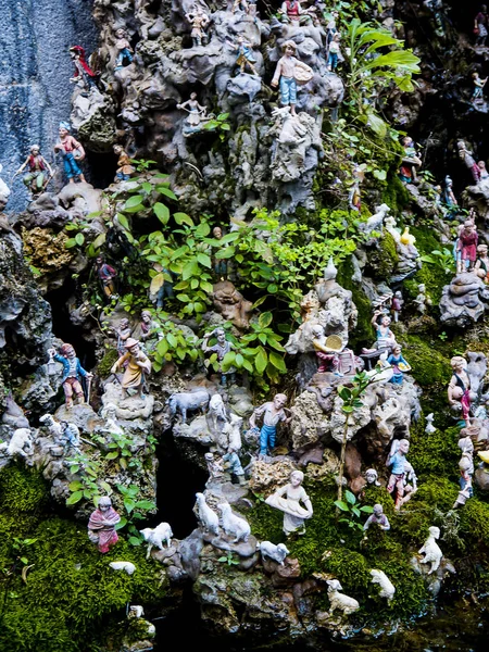 Amusing fountain with tiny figures in Amalfi Italy depicting life in the mountains surrounding the city