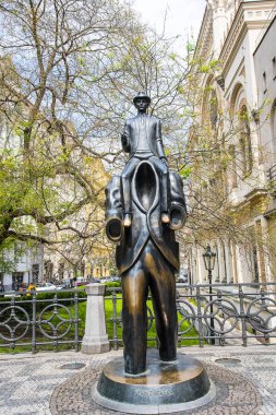 Franz Kafka was a writer born in Prague  His work, which fuses elements of realism and the fantastic, typically features isolated protagonists facing bizarre or surrealistic predicaments and incomprehensible socio-bureaucratic powers.