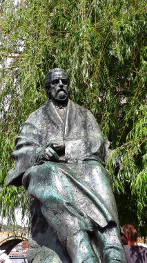 The Statue of Czech Composer Bedrich Smetana by his beloved River Vltava in front of his Museum in Prague in Czech Republic. Ma vlast is a set of six symphonic poems composed between 1874 and 1879 by the Czech composer with its evocation of the river