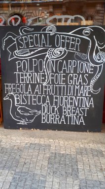 Czech specialty foods on restaurant menu board in the city of Prague in the Czech Republic. Prague being a capital city has a great man restaurants vying for business