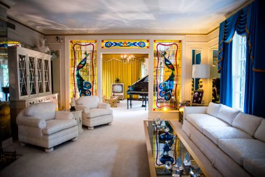Graceland is a mansion  in Memphis, Tennessee and was home to Elvis Presley. It is located less than four miles north of the Mississippi border. It opened to the public in 1982.These were the rooms he lived in clipart