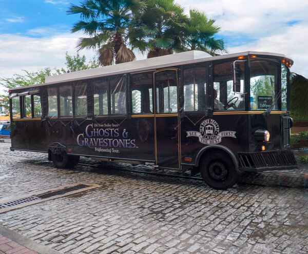 Tour bus for Ghost Tours of Savannah in Georgia which are a spooky experience.This one was by the river and caters to tourists