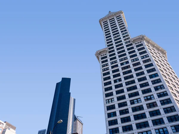 The cityscape of Seattle. Seattle on the Puget Sound  became a commercial centre and a gateway to Alaska during the Klondike Gold Rush. The city became a technology hub in the 1980s.