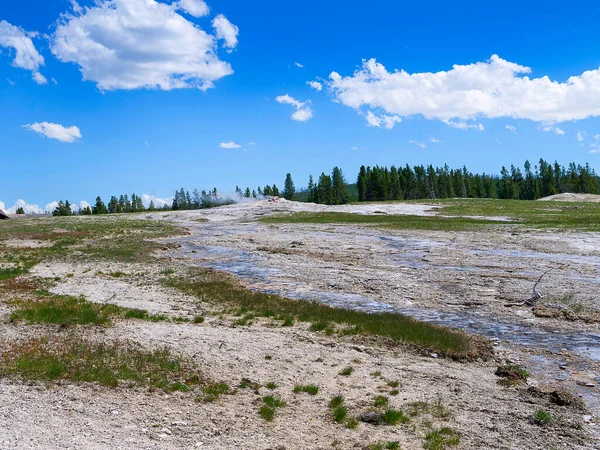 The active Geysers and geothermal pools of Yellowstone National Park. Yellowstone was the world\'s first National Park. The caldera is considered an active volcano.Half of the world\'s geothermal features are in Yellowstone, fueled by this volcanism.