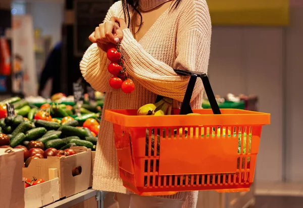 Girl Holds Branch Tomatoes Her Right Hand Orange Basket Full — Stock Photo, Image