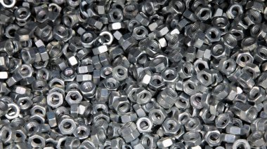 Kaçık. Doku. Cıvata ve vida için bir sürü lastik fındık. Duvar kağıdı için arkaplan.