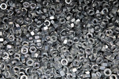 Kaçık. Doku. Cıvata ve vida için bir sürü lastik fındık. Duvar kağıdı için arkaplan.