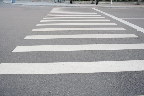 Zebra crossing on asphalt road