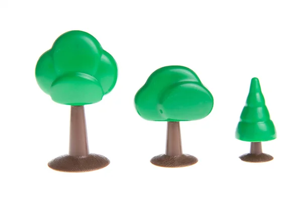 白地に孤立したプラスチックおもちゃの木 — ストック写真