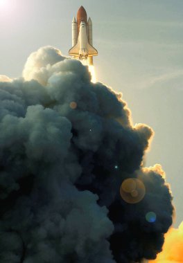 Dramatic rocket launch. Clouds, smoke and gas. Rocket launch pla clipart