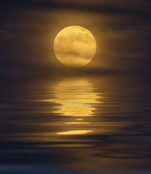 Full moon and sea waves with light. Some elements of this image