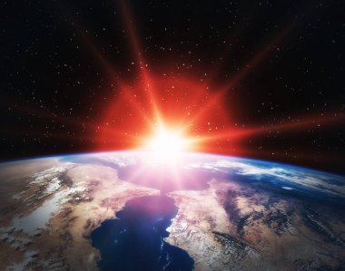 Uzaydan destansı gün doğumu. Bu görüntünün unsurları tarafından döşenmiş