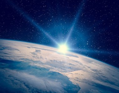 Dünya gezegeni ve büyüleyici gün doğumu. Bu görüntünün öğeleri