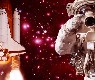 Kamera ve roket (mekik) ile Astronot. Bunun unsurları