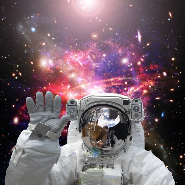 Astronaut waves. The elements of this image furnished by NASA. — Stock Photo, Image