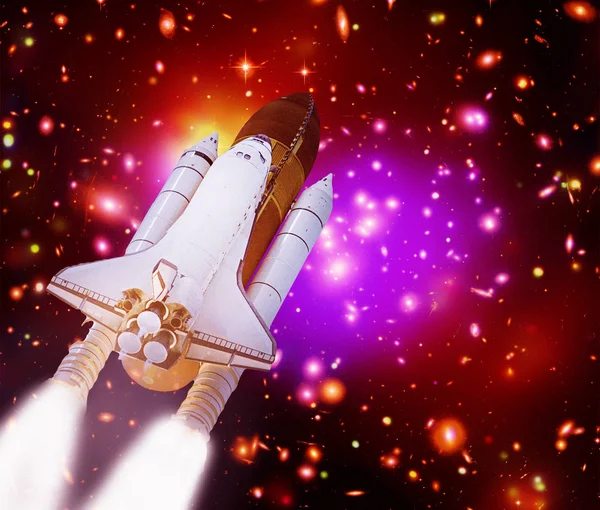 Big rocket (shuttle) lift off to stars and galaxies. The element