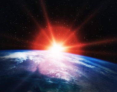 Uzaydan destansı gün doğumu. Bu görüntünün unsurları tarafından döşenmiş