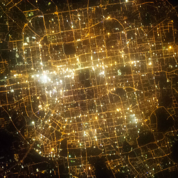 Earth at night from space. City lights. The elements of this ima