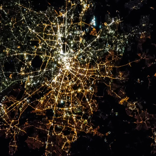 Earth at night from space. City lights. The elements of this ima