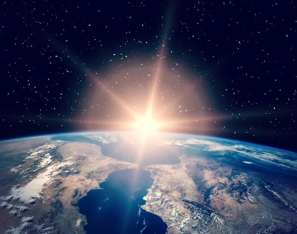 Sunrise over the earth. The elements of this image furnished by