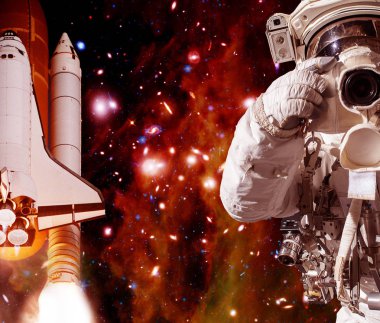 Kamera ve roket (mekik) ile Astronot. Bunun unsurları