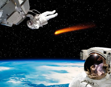 Astronot ve kuyruklu yıldız. Nas tarafından döşenmiş bu görüntünün unsurları