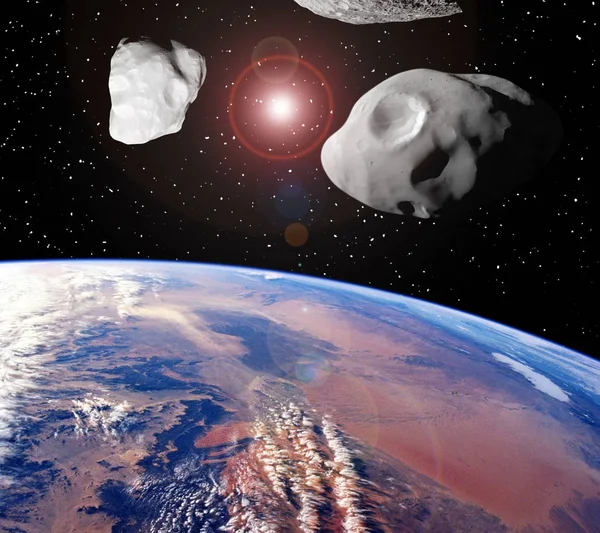 Asteroides sobre la tierra. Los elementos de esta imagen amueblados — Foto de Stock