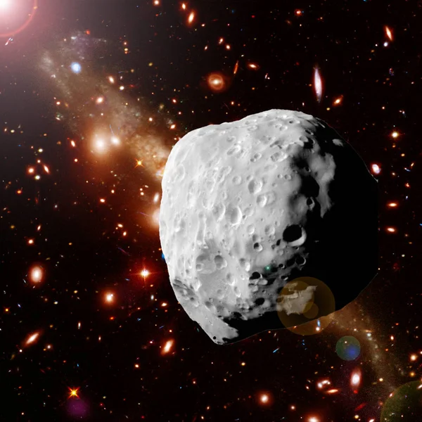 Asteroide volando en el espacio profundo. Los elementos de esta imagen furnis — Foto de Stock