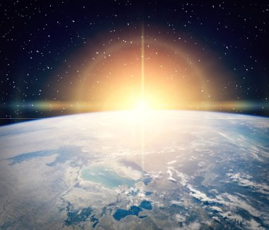 Gün doğumu sırasında uzaydan gelen Dünya. Bu görüntüfu elemanları