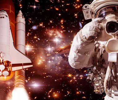 Kamera ve roket (mekik) ile Astronot. Bunun unsurları