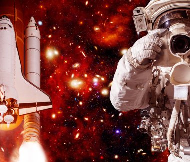 Kamera ve roket (mekik) ile Astronot. Bunun unsurları