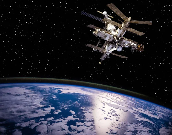 Jorden och rymdstationen. De delar av denna bild som — Stockfoto
