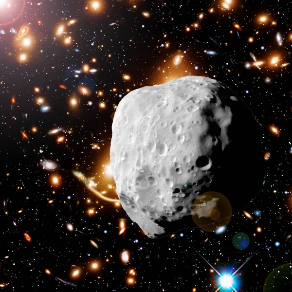 Asteroide volando en el espacio profundo. Los elementos de esta imagen furnis — Foto de Stock