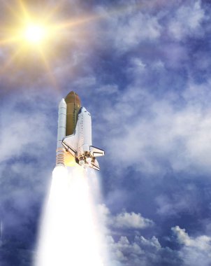 Sunflare ve roket. Nas tarafından döşenmiş bu görüntünün unsurları