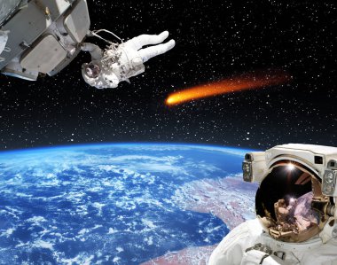Astronot ve kuyruklu yıldız. Nas tarafından döşenmiş bu görüntünün unsurları