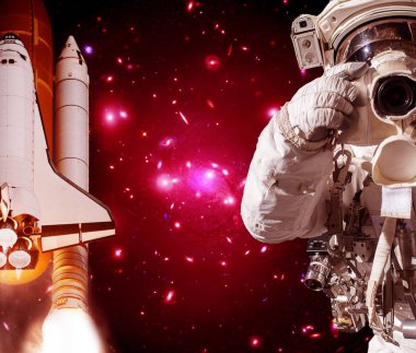 Kamera ve roket (mekik) ile Astronot. Bunun unsurları