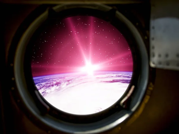 Beautiful sunrise from space. View from spacecraft. Elements of