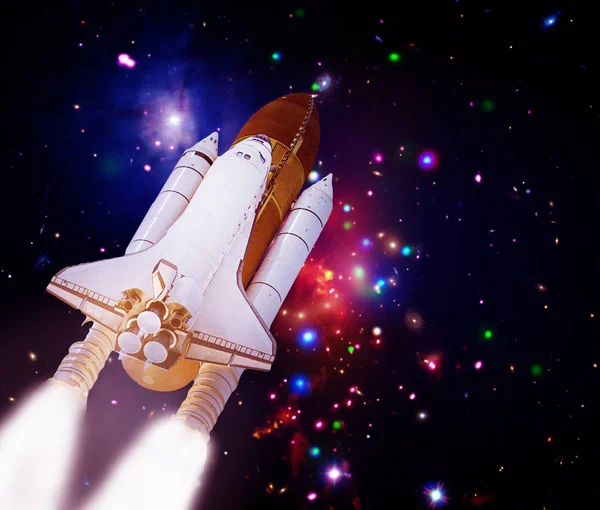 Big rocket (shuttle) lift off to stars and galaxies. The element
